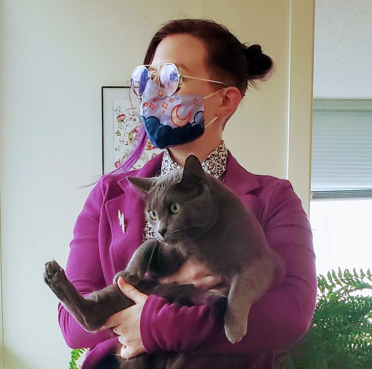 Jam in 2020 with their foster cat Kankuro